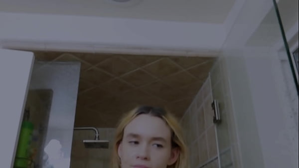 Cute blonde takes sexy shower